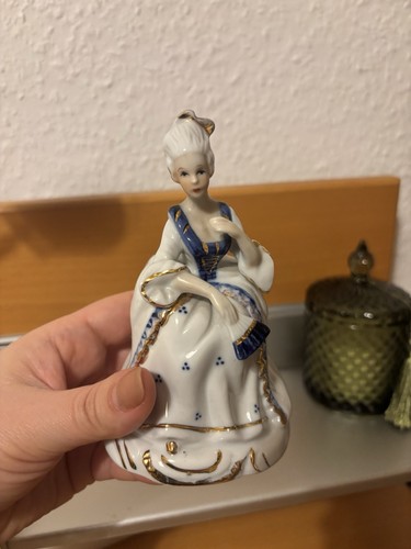 Vintage porzellanfigur einer - vintage-porzellanfigur,